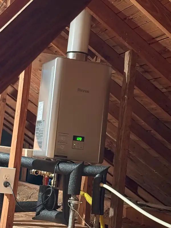 Attic Tankless Water Heater by Level Up Plumbing